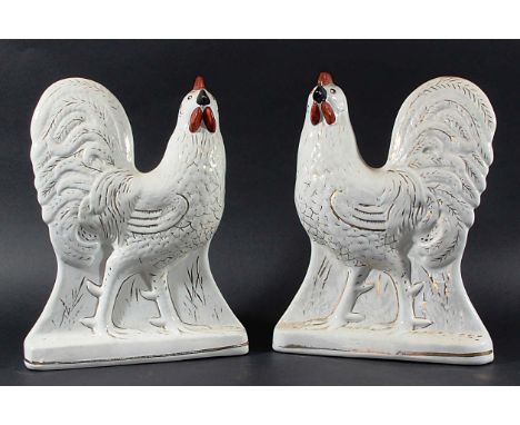 PAIR OF STAFFORDSHIRE COCKERELS, with a red wattle and comb and gilt highlights, height 31cm (2)