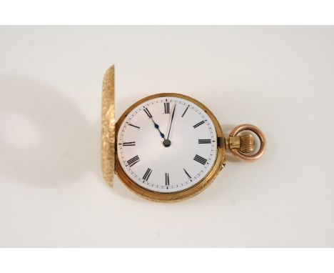 AN 18CT. GOLD HALF HUNTING CASED POCKET WATCH the white enamel dial with Roman numerals, glass missing, outer chapter ring wi