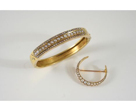 AN EARLY 20TH CENTURY PEARL AND GOLD HALF HINGED BANGLE set to one side with graduated half pearls, together with a 15ct. gol