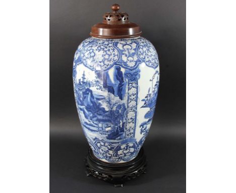 CHINESE BLUE AND WHITE VASE, of slender ovoid form, blue painted with alternating panels of mountainous landscapes and basket