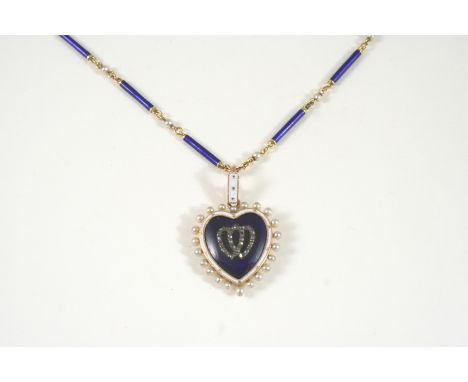 A VICTORIAN ENAMEL, PEARL AND DIAMOND HEART-SHAPED LOCKET PENDANT the blue enamel heart is centred with a double heart motif 
