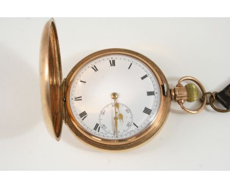 A 9CT. GOLD HALF HUNTING CASED POCKET WATCH the white enamel dial with Roman numerals and subsidiary seconds dial, engraved w