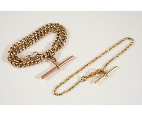 A 9CT. GOLD CURB LINK WATCH CHAIN suspending a 9ct. gold 't' bar, 26cm. long, 26 grams, together with a small 9ct. gold watch