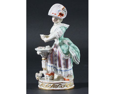 MEISSEN FIGURE, late 19th or early 20th century, modelled as a lady standing playing cards, incised and blue crossed swords m