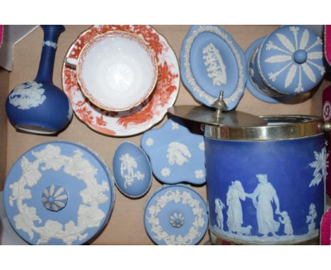 A collection of Wedgwood Jasperware ceramic items to include lidded pots, vases and a biscuit barrel in colours Wedgwood blue