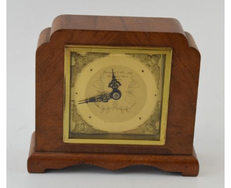 Garrard &amp; Co Ltd, London, Mantle clock. Gilt dial with cherubs in relief to four corners. Art Deco style wooden case with