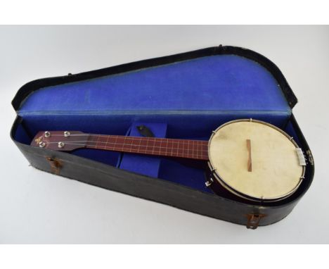 A vintage Banjolele / Ukulele, 'British Made' In carry case. Length 52cm.