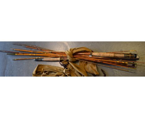 A collection of split cane fishing rods to include examples by 'Allcocks' Popular model and Lucky Strike, together with 'Milb