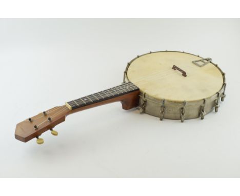 A vintage Banjolele / Ukulele, marked 'SAVANA'. Wooden neck and metal body. Length 61cm. Drum diameter 29cm.