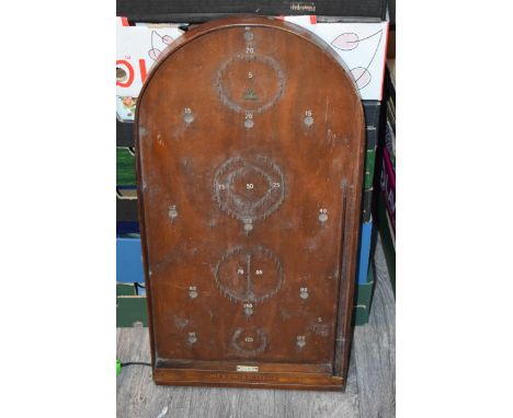 A 'Jaques' 'Hit-A-Pin' Bagatelle game board with balls. Height 76cm.