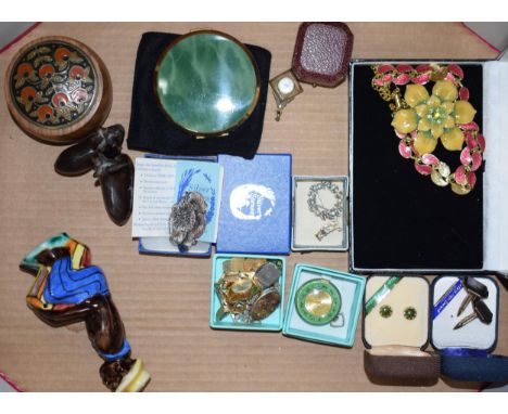 A mixed collection of vintage and modern costume jewellery to include watches, brooches, cufflinks and necklaces. Of note a v