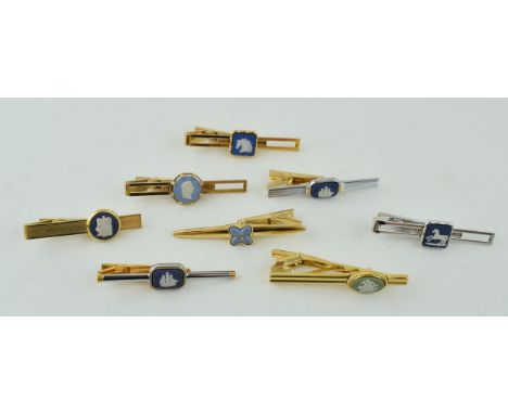 A collection of 8 Wedgwood Jasperware tie pins, some gold tone, to include horses, galleons and others.
