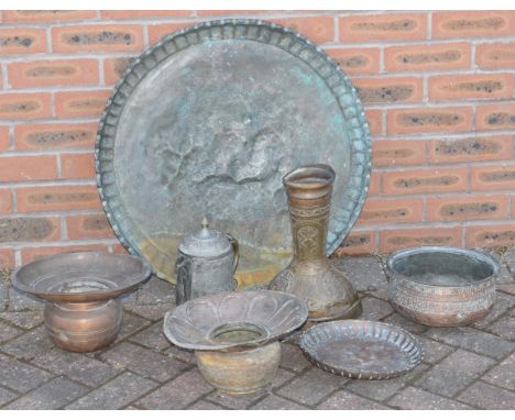 A large collection of antique middle eastern copper ware to include trays, drum, cooking bowl, kettle and other similar item.