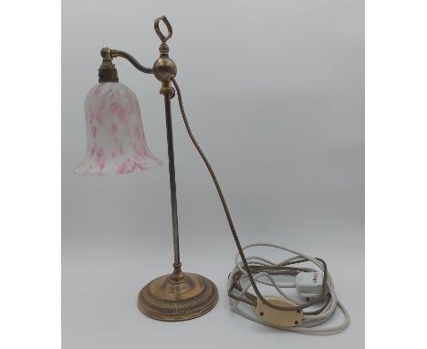 A vintage brass table lamp with rise and fall action and a glass shade. H.49cm 