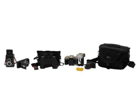 Various cameras, to include a Minolta autochord reflex, an Olympia EL1124, etc. 