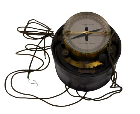 A late 19thC/early 20thC galvanometer, the silvered dial stamped Telegraph Works, London, in partial leather case.
