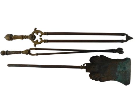 Three brass fireside implements, comprising two pairs of tongs, and a shovel, lacking finial.