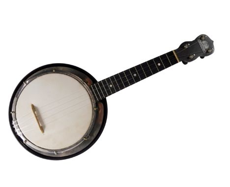 A George Formby walnut ukulele banjo, 54cm long. 