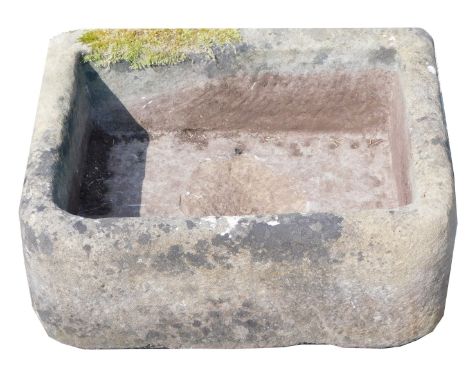 A carved rectangular sandstone trough, 22cm high, 54cm wide, 42cm deep. 