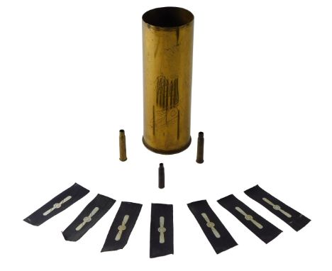 A French Trench Art brass shell, engraved with cannon, and various other motifs, modern RAF Leading Aircraftsman arm rank pat