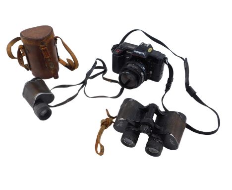 A Minolta 5000 camera and lens, and a Zeiss monocular, and a pair of Raylite binoculars.