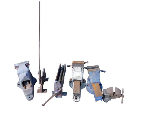 A hand-operated metalwork guillotine, together with a large Fortis steel bench vice, a Samsonia bench vice, a Record number 5