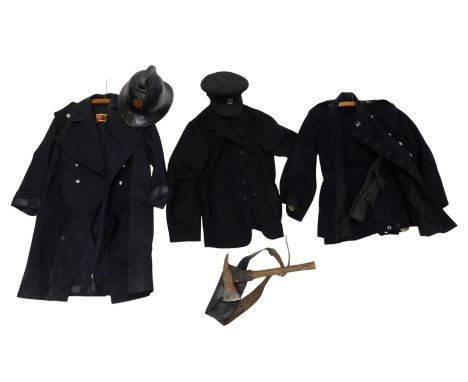 A group of early 20thC fireman's apparel, to include a jacket with trousers and belt, further jacket, a Bolton Corporation ca