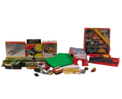 Hornby OO gauge scenery, etc., to include engine shed, automatic level crossing, elevated track supports, a clockwork super s