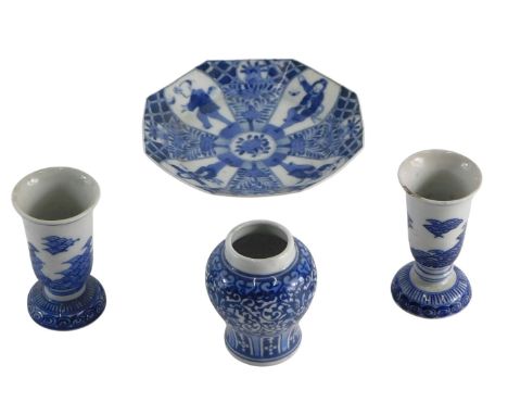 A late 18th/early 19thC Chinese porcelain small octagonal plate or dish, decorated with figures within compartments, flanked 