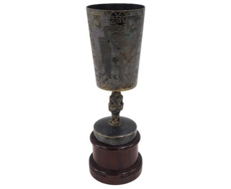 A mid 20thC Peruvian silver plated tennis trophy, engraved with tennis players, Inka motifs, etc., stamped 'Mens Double Tenni