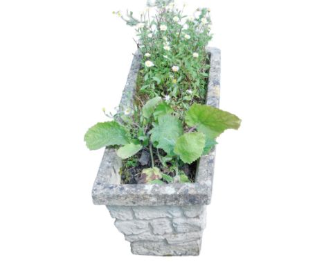 A rectangular reconstituted stone planter or trough, 26cm high, 66cm wide, 27cm deep. 