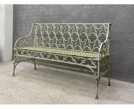 A heavy 19th century painted cast iron openwork Gothic Revival garden bench in the manner of Coalbrookdale. (Small damage to 
