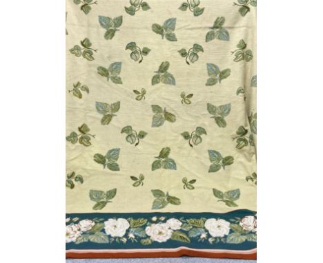 A very large 20th century hand woven Chilean needlepoint carpet having an all-over repeating foliate pattern over a biscuit g