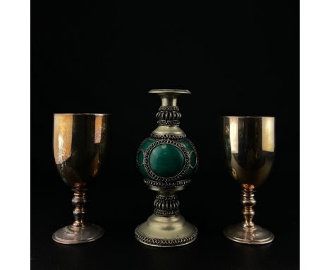 A pair of silver plated Mappin &amp; Webb goblets along with an Eastern style wirework and enamelled metal candlestick. H.19.