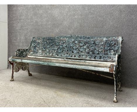 A 19th century painted cast iron openwork Nasturtium garden bench by Coalbrookdale with indistinct maker's marks. H.87.5 W.18