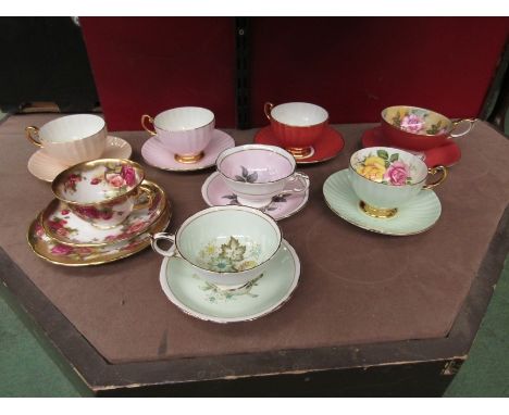 Eight cups and saucers with internal floral decoration- Aynsley, Royal Chelsea, etc. (Paragon example a/f) 