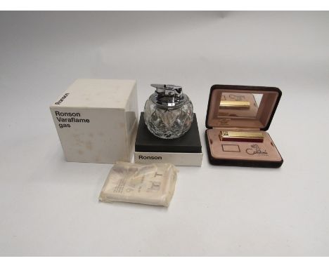 A boxed Ronson table lighter and a cased Colibri lighter (2) 