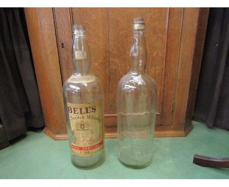 Two vintage Bell's Scotch Whiskey oversized bottles, approximately 51cm tall 