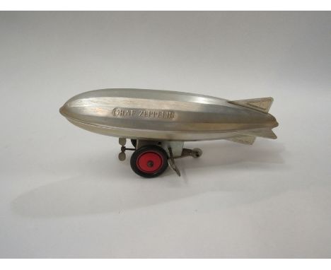 A clockwork aluminium model of a Graf Zeppelin 24cm long 