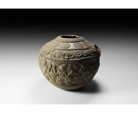 2nd-1st century BC. A bulbous ceramic spouted vessel with elaborate frieze of six fish-tailed elephants between rosettes to t