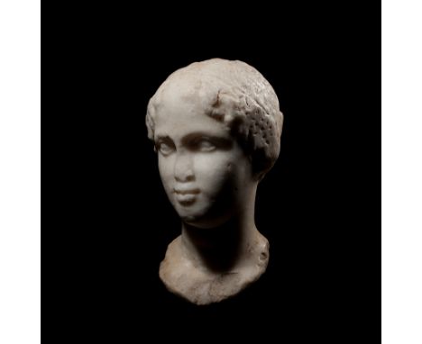 Ptolemaic Period, 1st century BC. A late Hellenistic bust of a young Ptolemaic queen, possibly Cleopatra VII, her head turned