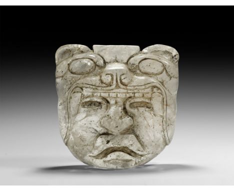 Pre-Classical Period, 12th-2nd century BC. A rock crystal mask with a human face with feline features emerging from the mouth