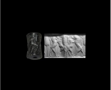 23rd-22nd century BC. A substantial jasper cylinder seal with combat scenes; accompanied by a museum-quality impression and t