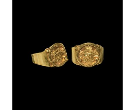 2nd-3rd century AD. A gold finger ring comprising a flat-section hoop, applied beaded wire collar with granules inside and ou
