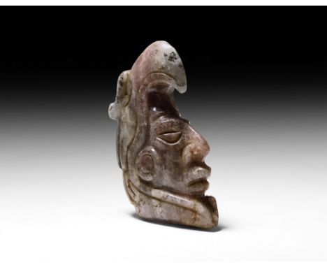 Post-Classical Period, 8th-12th century AD. A warrior's head in amethyst with a bird of prey headdress (condor), the bird of 