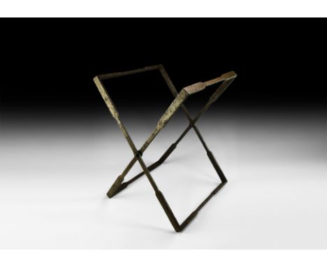 5th-7th century AD. An iron folding campaign stool frame of Nocera Umbra variant type with balustered legs, top and base; wid