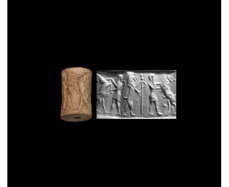 23rd-22nd century BC. A substantial limestone cylinder seal with heroes and bulls; accompanied by a museum-quality impression