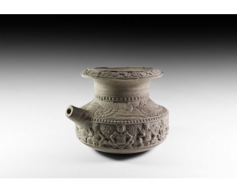 2nd-1st century BC. A squat ceramic vessel with flared rim with birds and rosettes; to the body an elaborate frieze of sittin