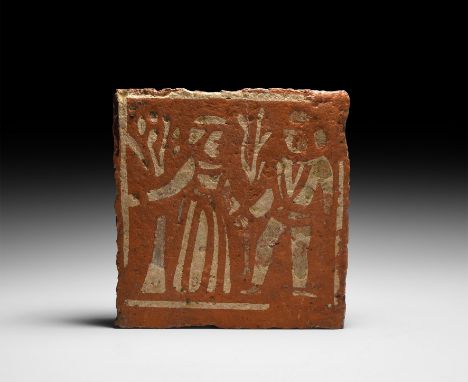 Late 15th century AD. A glazed tile from Beauvais(?), France, depicting a courting couple holding hands amidst trees. 745 gra