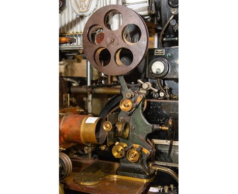 A Bioscope 35mm movie projector with Pathe Freres lantern, beater movement. Believed to be made in America, c.1912-1916Please